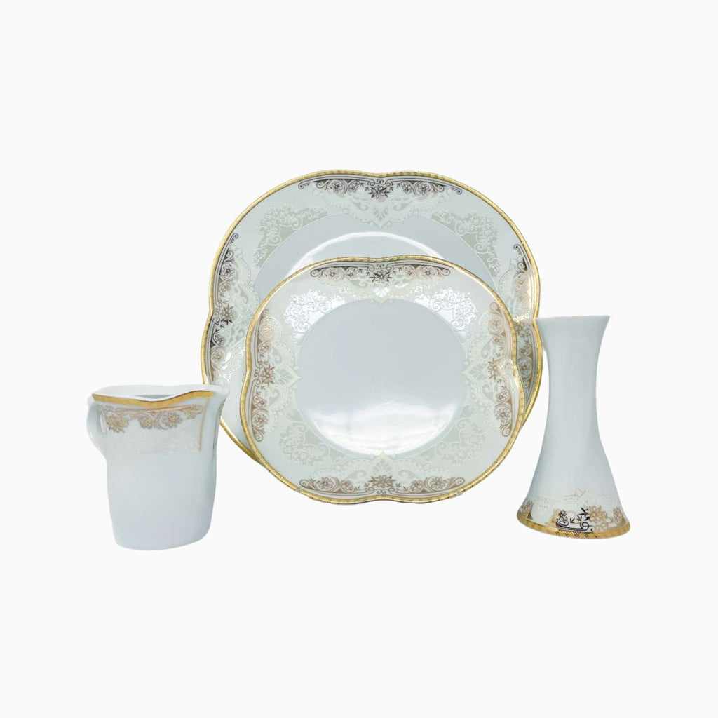 Dinnerware set with plates, bowl on a white background