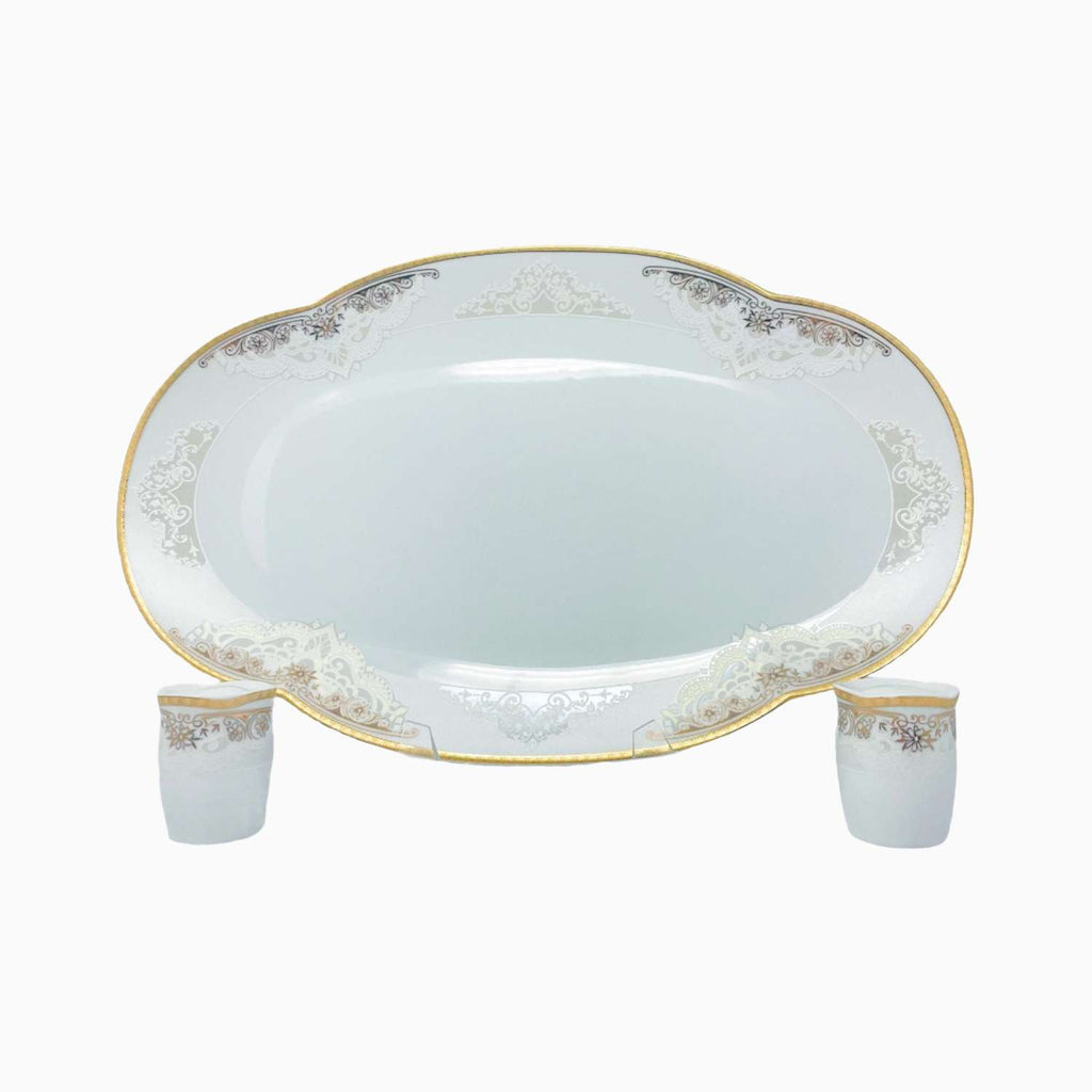 Decorative ceramic platter with floral patterns on a white background