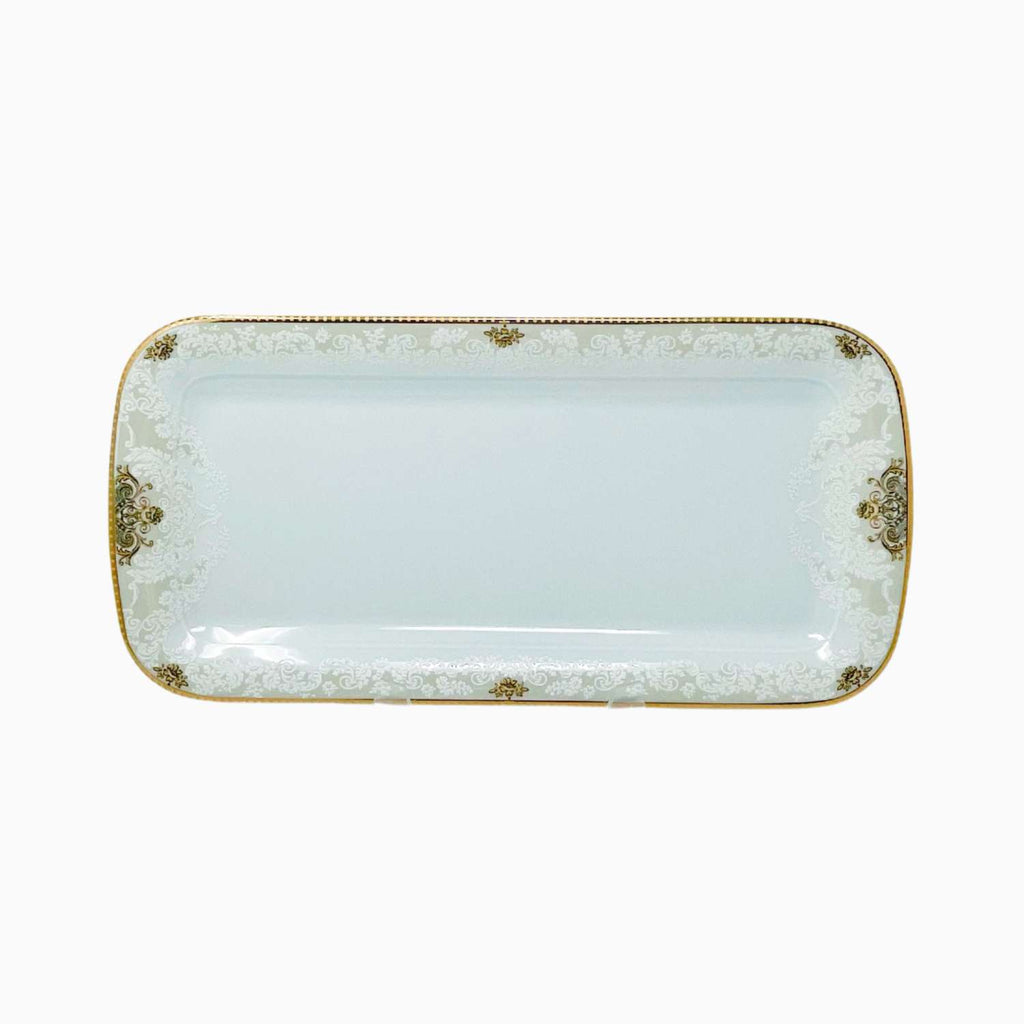 Rectangular ceramic plate with gold decorative edges on a white background