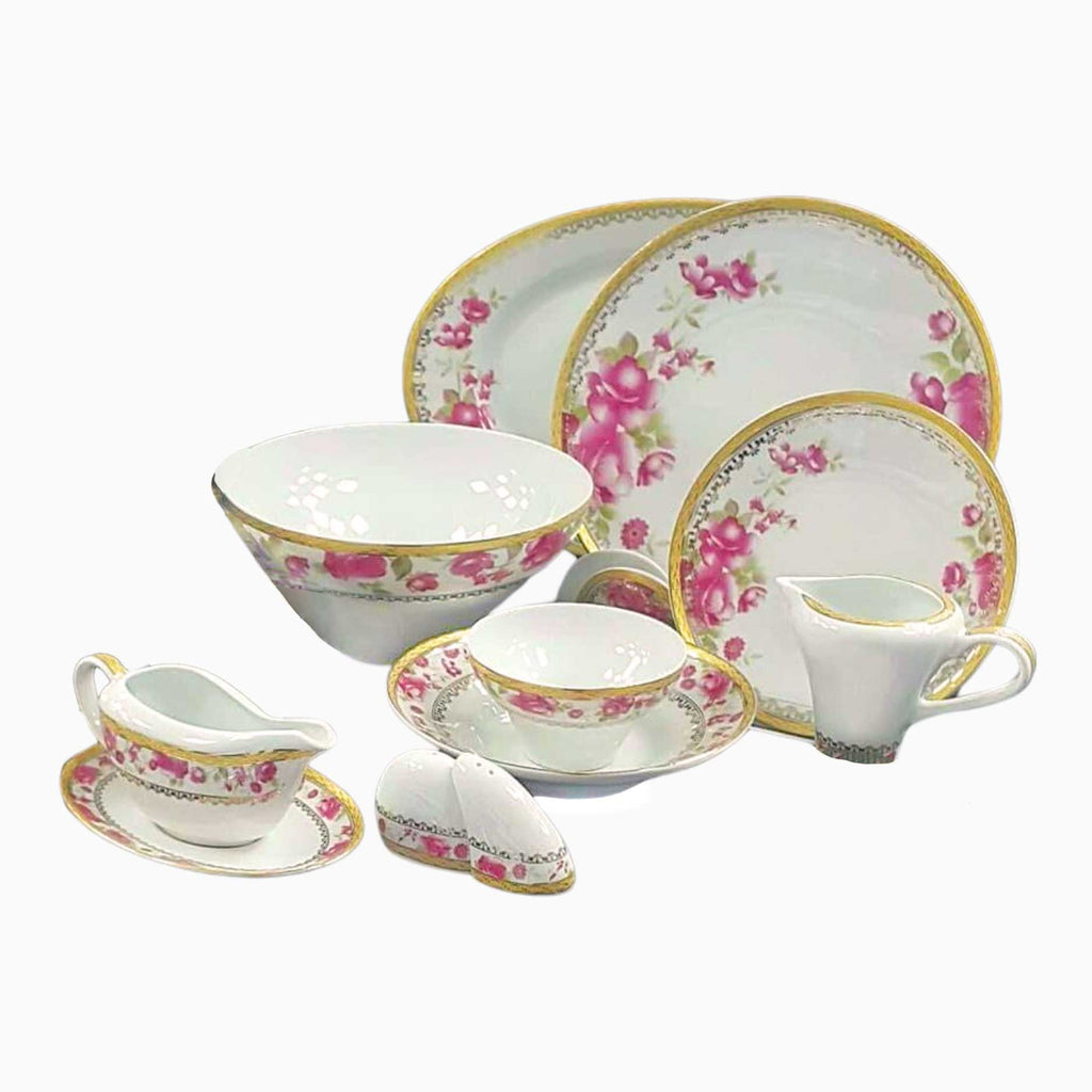 Elegant white porcelain dinnerware set with intricate gold detailing, designed for refined and luxurious dining experiences. Noble Home Gifts