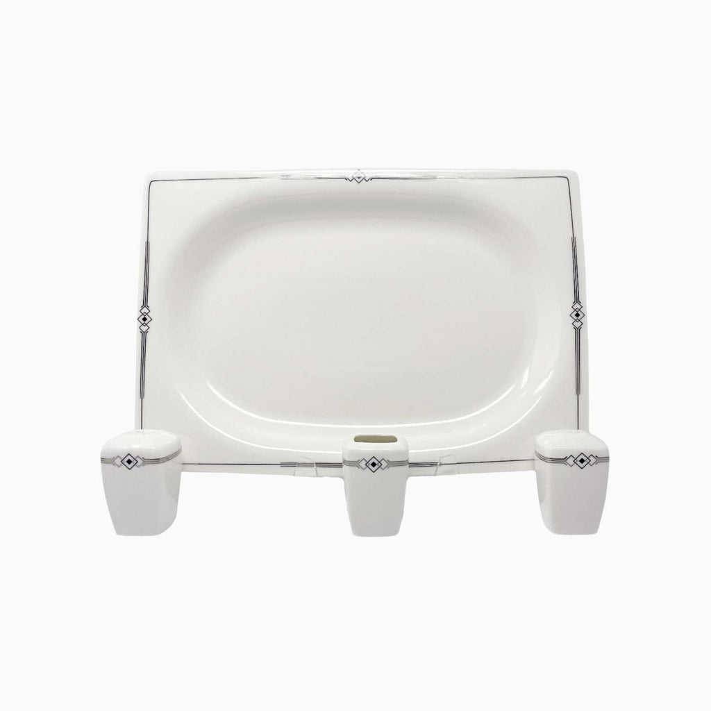 White rectangular plate with decorative black on a white background