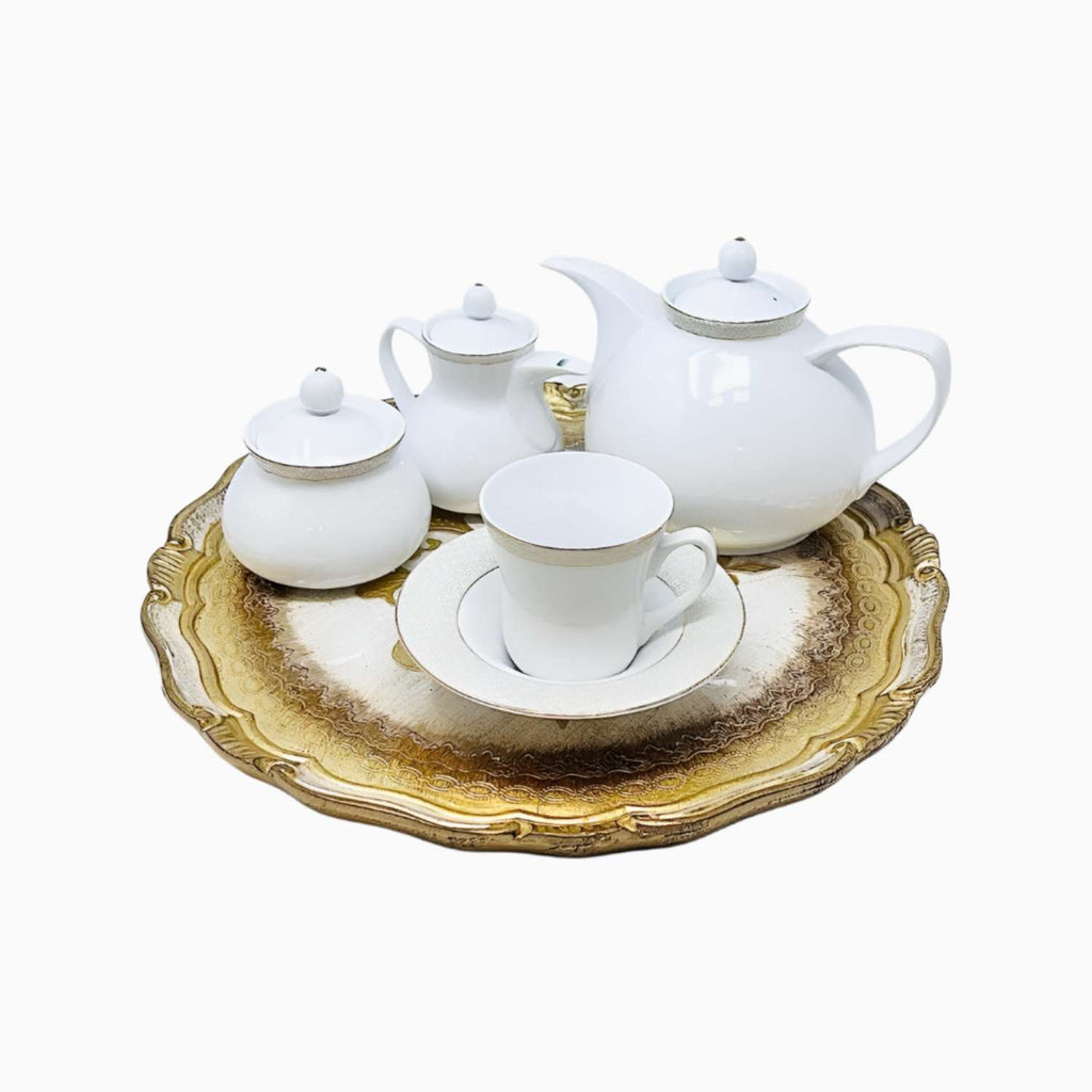 White ceramic tea set on a white background