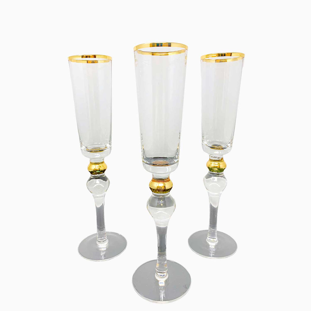 FOUR-PIECE GOLD RIMMED STEMWARE