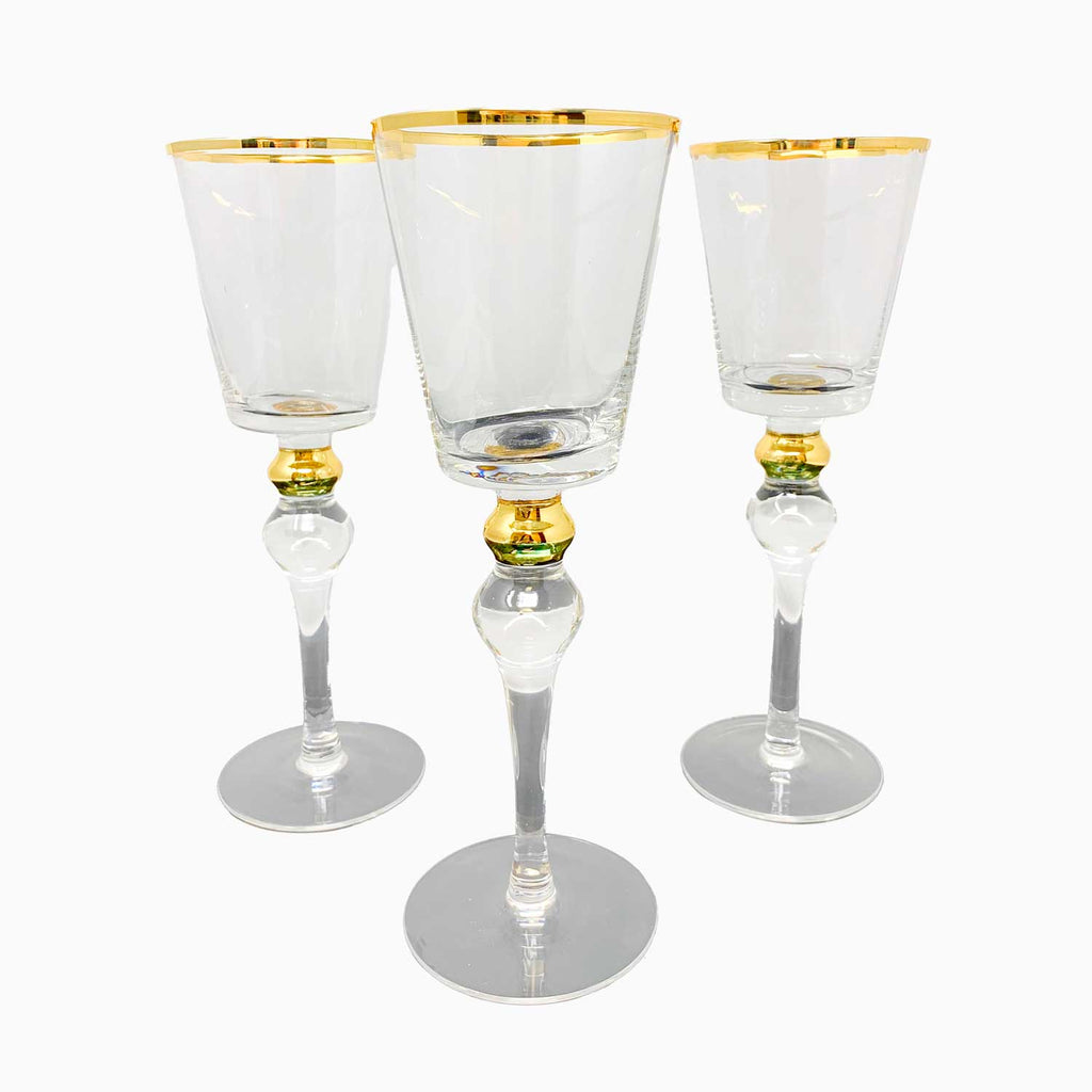 FOUR-PIECE GOLD RIMMED STEMWARE