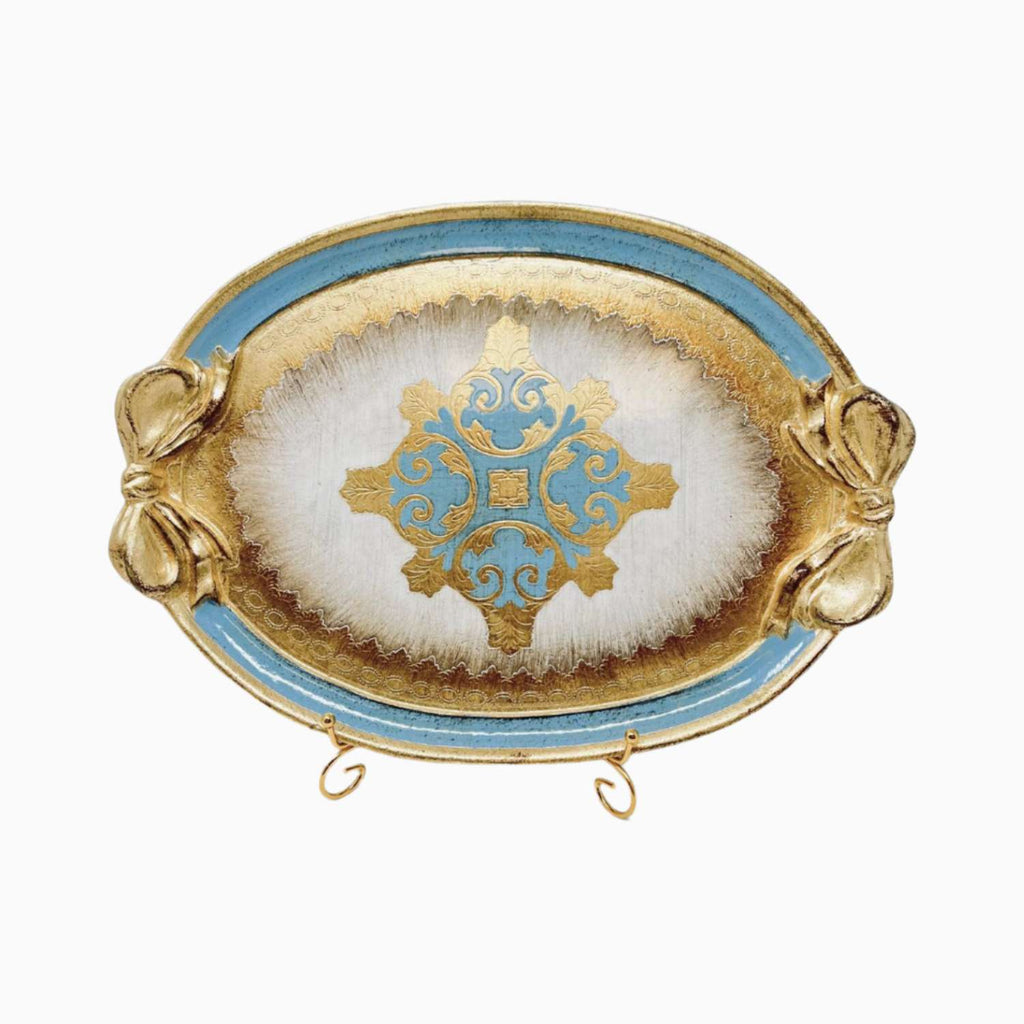 Decorative tray with gold and blue design on a white background
