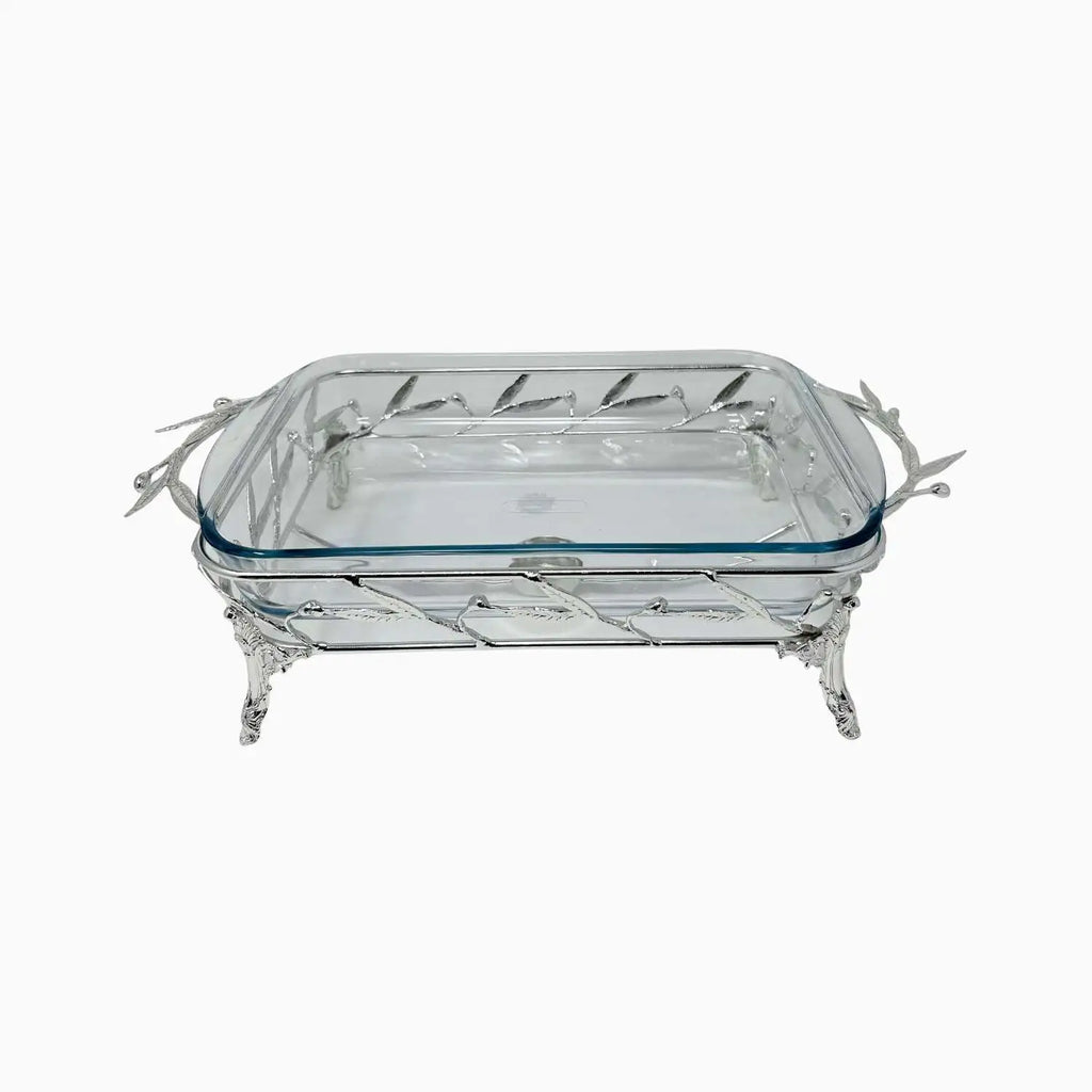 Pyrex serving dish with silver decorative frame on a white background