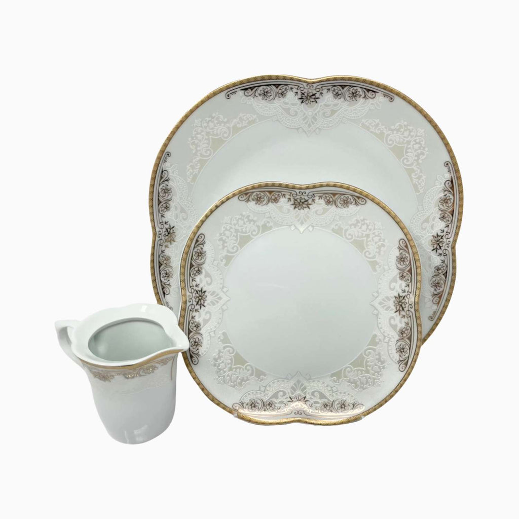 Set of decorative ceramic plates with intricate patterns on a white background