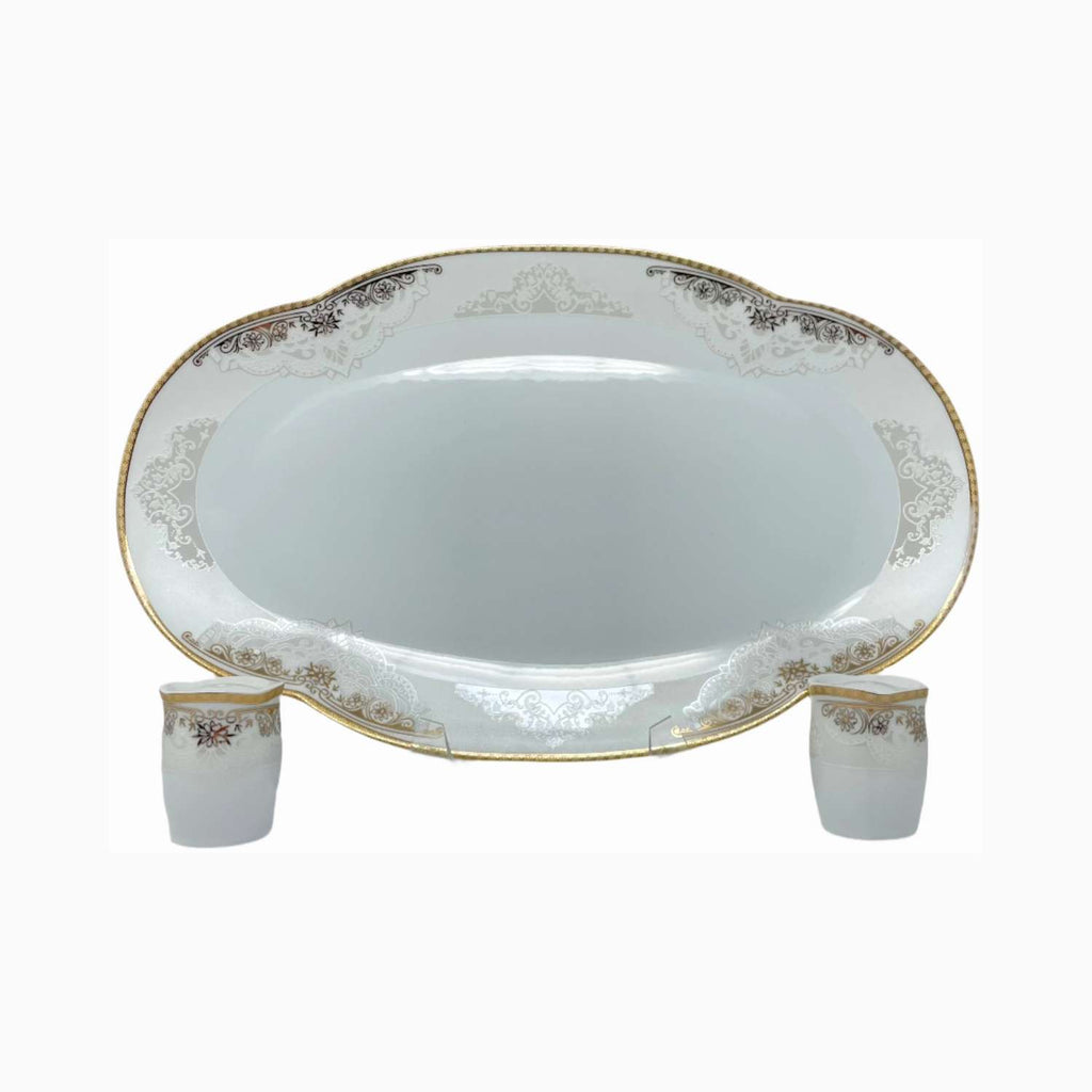 Decorative ceramic platter with floral patterns on a white background