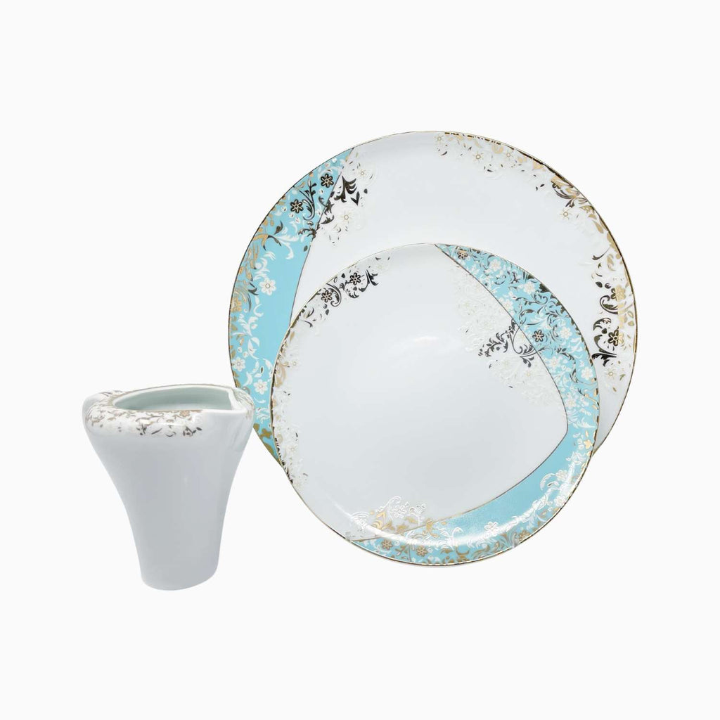 Dinnerware set with decorative plates and a bowl on a white background