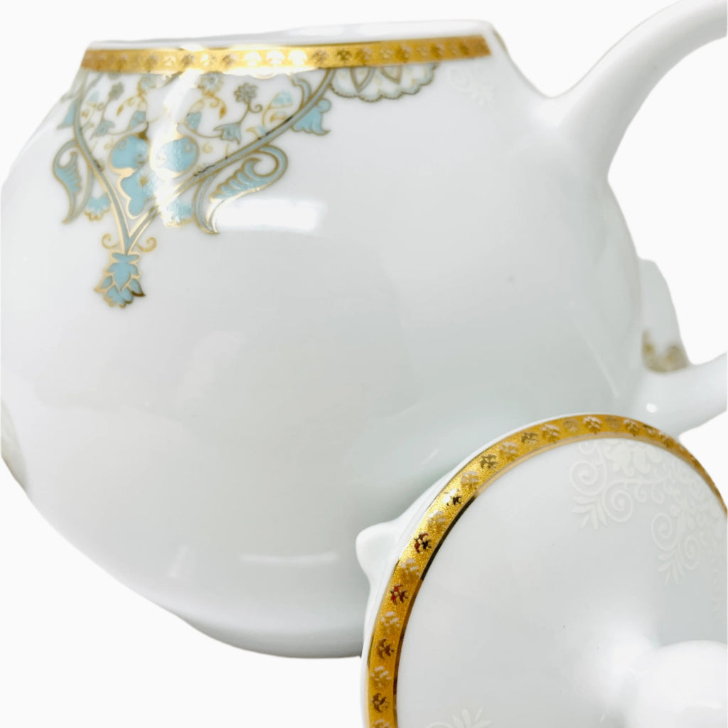 WHITE AND BLUE TEAPOT WITH LID