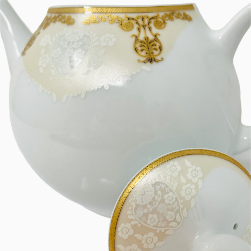 WHITE AND GOLD TEAPOT WITH LID