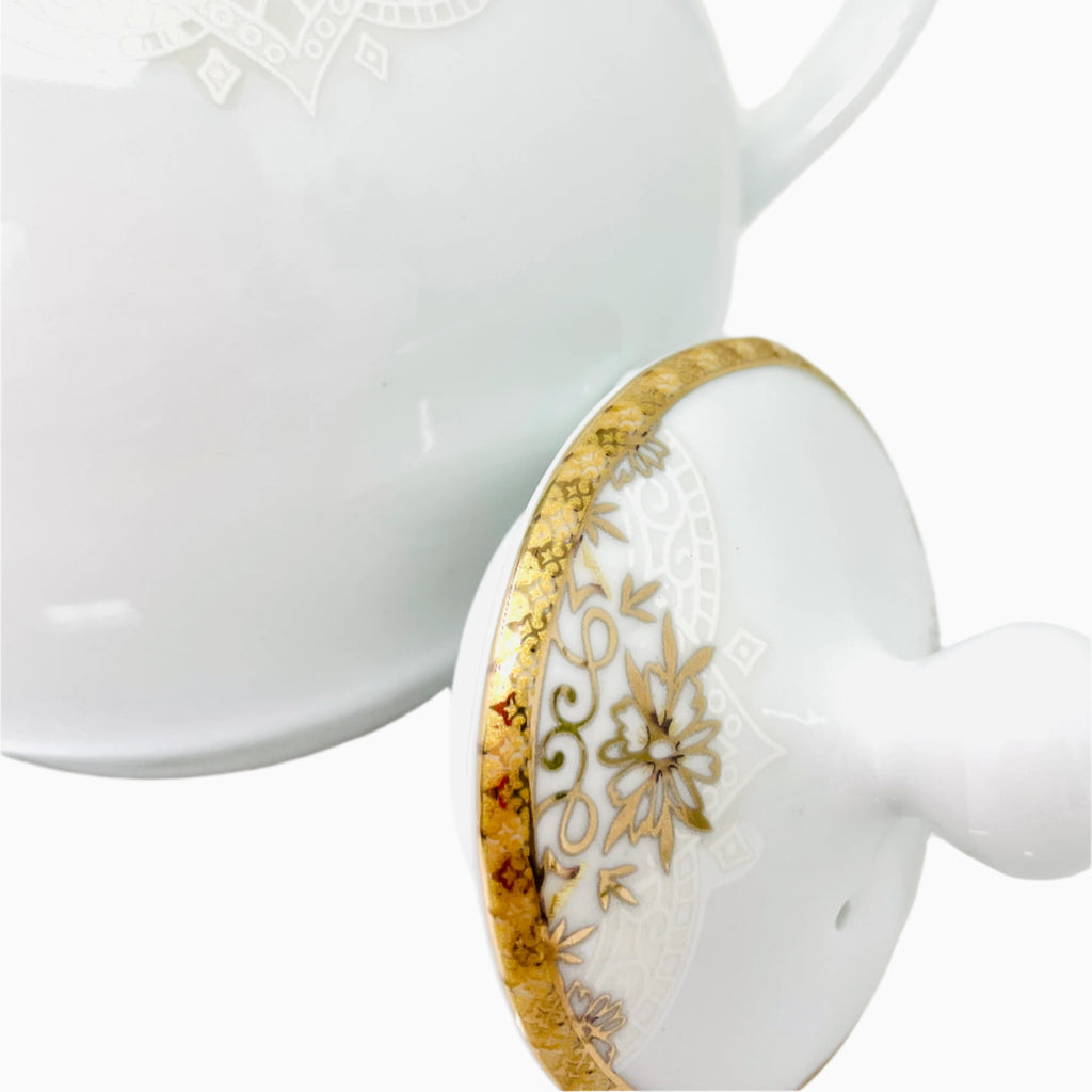 WHITE AND GOLD TEAPOT WITH LID