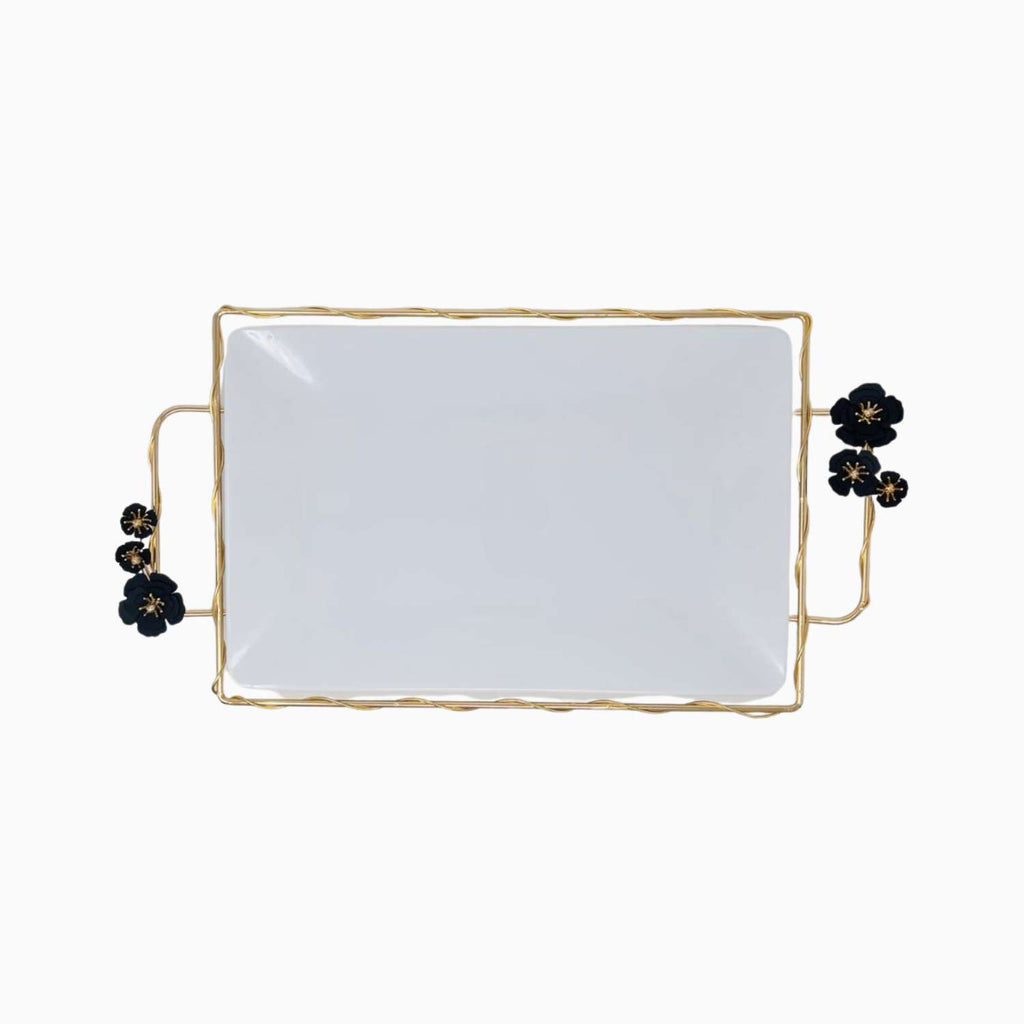 Rectangular white serving plate with gold frame and black floral accents on a white background