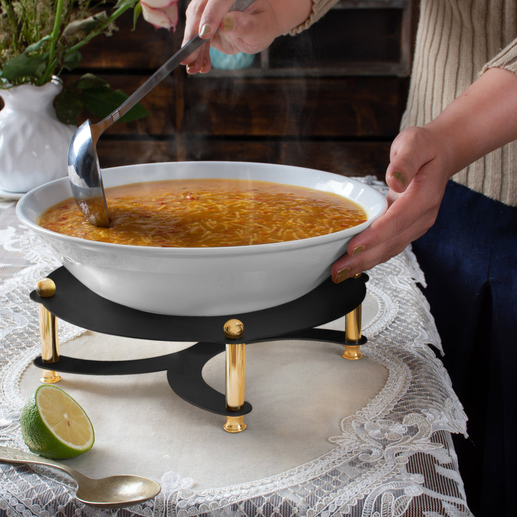 WHITE SOUP BOWL ON BLACK AND GOLD STAND